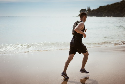 Man running on beach