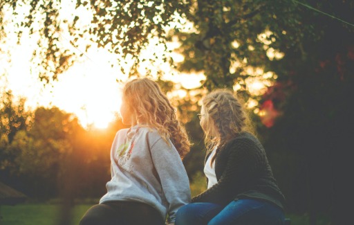 girls sitting in a tree