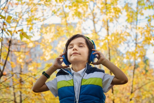 Boy listening to headphones