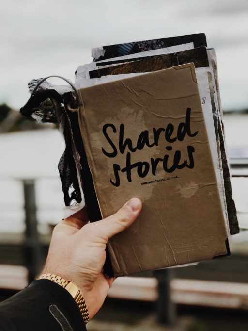 Person holding a journal