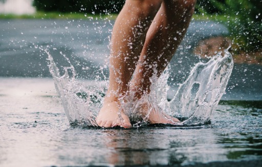 bring a memory to life People dancing in a puddle