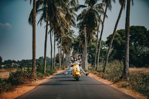 two friends riding a motorcycle