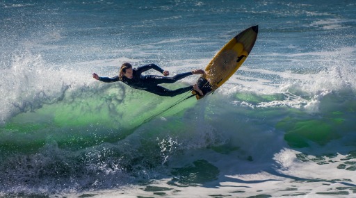 A person surfing on a big wave