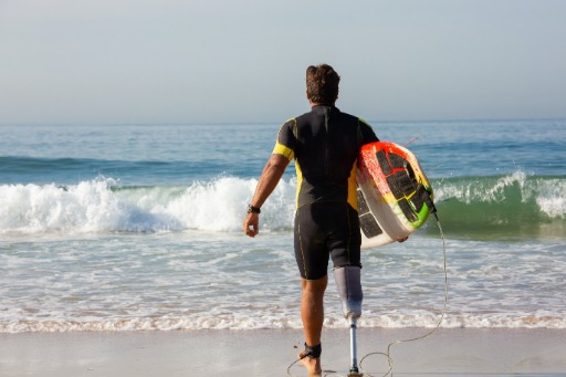 A disabled man surfing